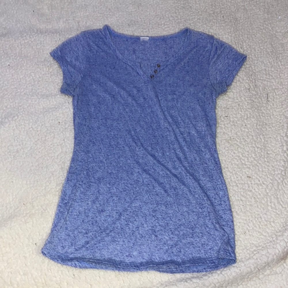 A blue short sleeve shirt with 3 button up